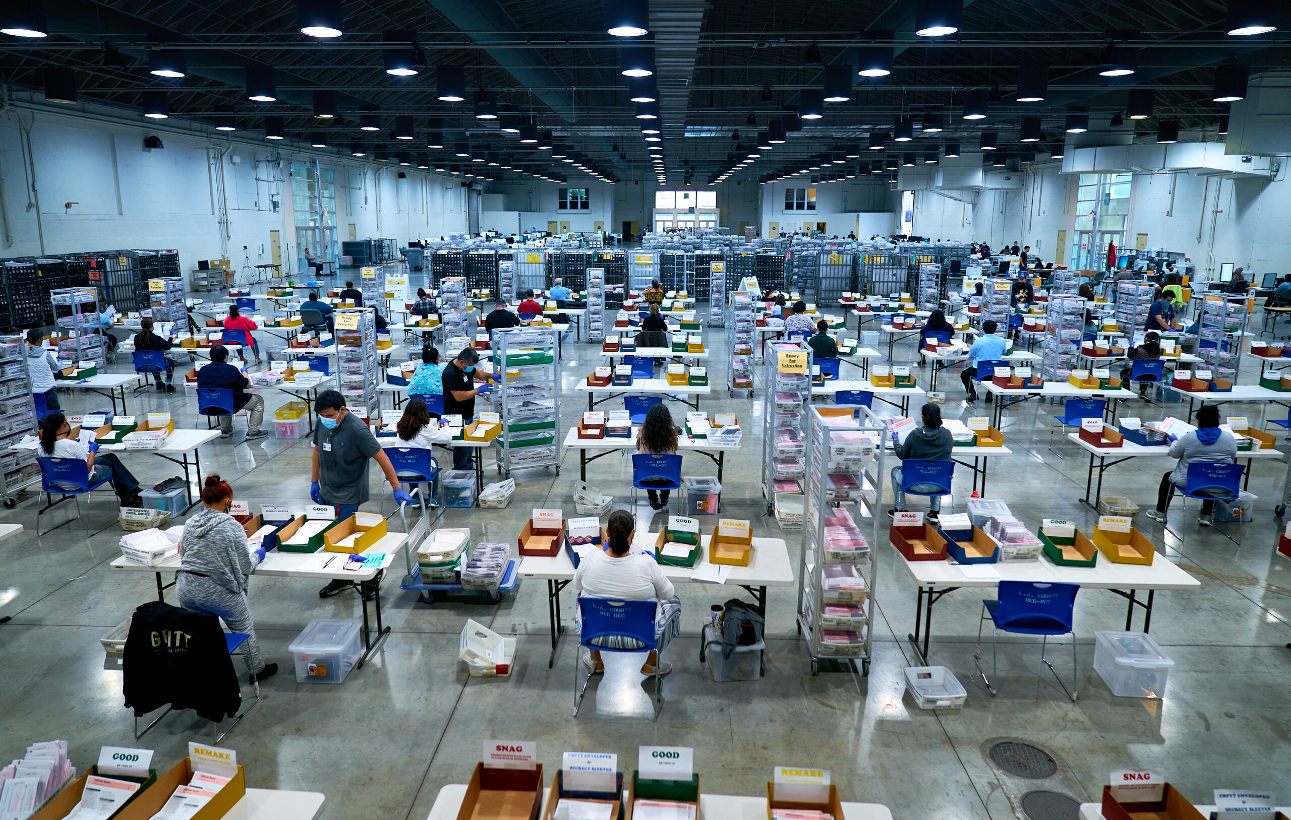 Vote By Mail Ballot Extraction. 2020 Presidential Election, absentee ballots, ballots, coronavirus pandemic, election, election security, mail ballots, politics, vote by mail, voting.