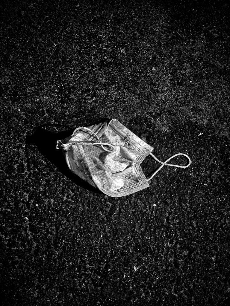 Mask On Pavement. covid, pandemic, mask, pavement.