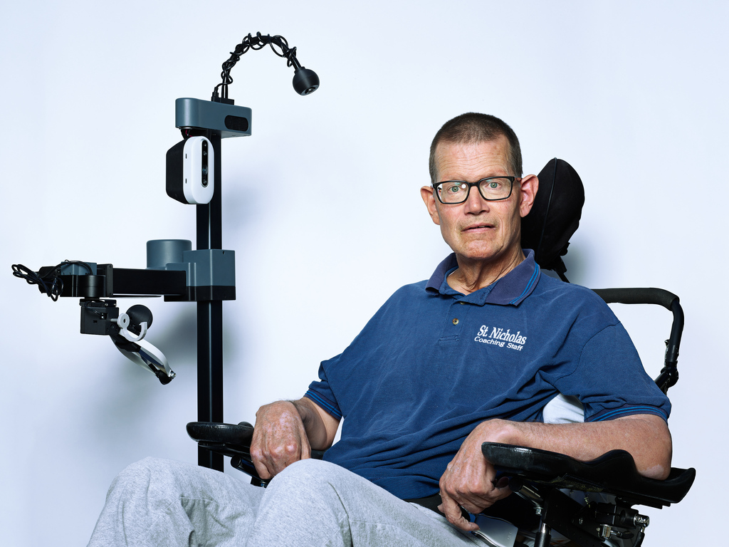 Stretch RE1 with Henry Evans. Stretch RE1, caregiver, disability, research, robot, robotics.