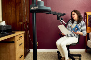 Printing a Recipe. Stretch RE1, caregiver, disability, research, robot, robotics, printer, book, office.