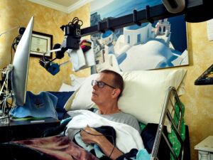 Henry Evans Brushing His Hair. Stretch RE1, caregiver, disability, research, robot, robotics.