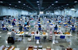 Vote By Mail Ballot Extraction. 2020 Presidential Election, absentee ballots, ballots, coronavirus pandemic, election, election security, mail ballots, politics, vote by mail, voting.