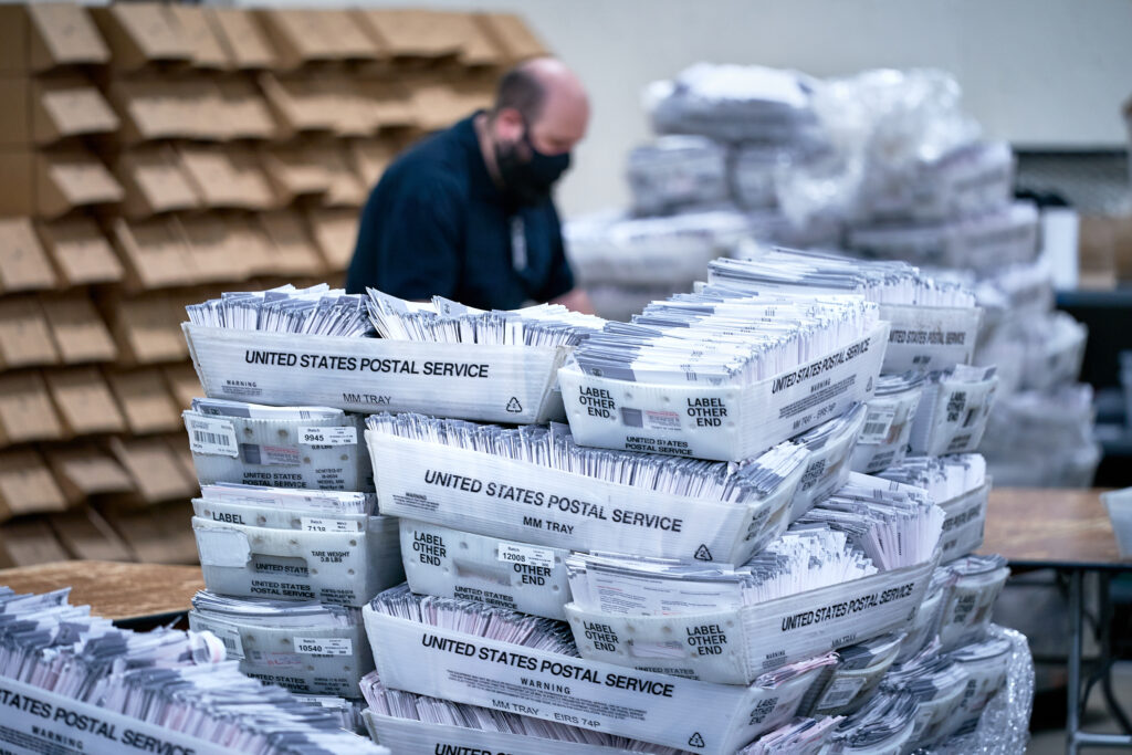 Vote By Mail Ballot Processing. 2020 Presidential Election, absentee ballots, ballots, coronavirus pandemic, election, election security, mail ballots, politics, vote by mail, voting.