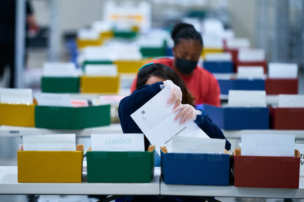 Vote By Mail Ballot Extraction. 2020 Presidential Election, absentee ballots, ballots, coronavirus pandemic, election, election security, mail ballots, politics, vote by mail, voting.