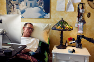 Picking a Rose. Stretch RE1, caregiver, disability, research, robot, robotics, flower, rose.